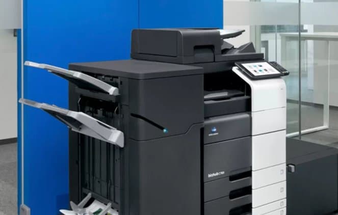 A multifunction office printer with finisher trays